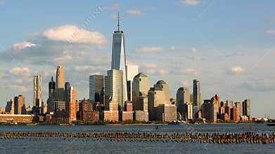 New York City Financial District skyscrapers and Hudson River in late afternoon
