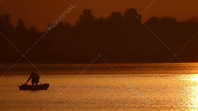 Fishing Boat at Sunset