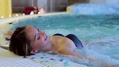Young beautiful woman in pool