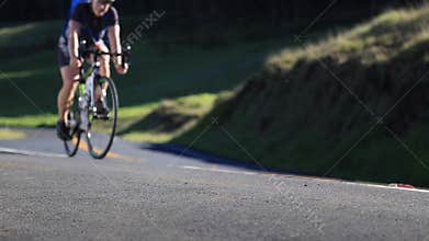 Healthy female cycling road bicycle