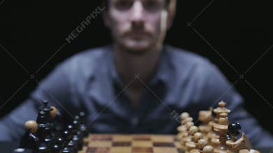 A chessboard appears in front of a player