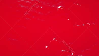 Red paint flowing down slowly. juice