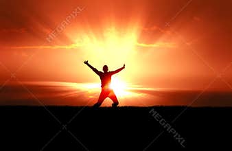 Man Jumping in Sun Rays