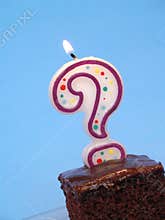 Birthday cake with question candle