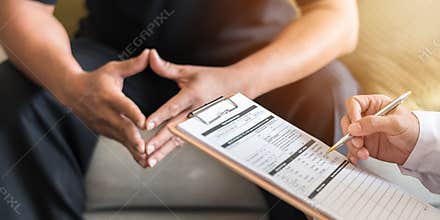 Men`s health exam with doctor or psychiatrist working with patient having consultation on diagnostic examination on male disease