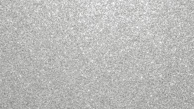 Silver glitter background texture white sparkling shiny wrapping paper for Christmas holiday seasonal wallpaper decoration