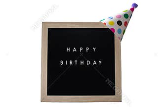 A Black Sign With a Birch Frame That Says Happy Birthday With a White Polka-Dotted Party Hat on Top