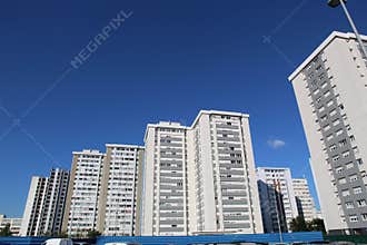 French High Rise Flats on Blue Sky Background