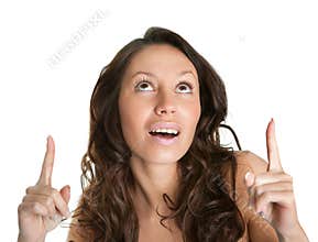 Cheerful women point up to copyspace