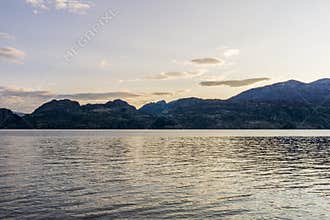 Cloudy sky seen from the shore of Okanagan lake at morning British Columbia Canada