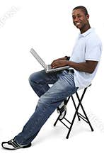 Attractive Young Man With Laptop Computer