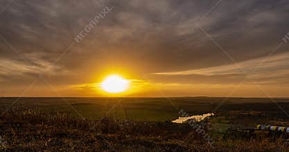 Aerial View Of Sunshine Bright Dramatic Sky. Scenic Colorful Sky At Dawn. Sunset Sky Above Autumn Field And Meadow