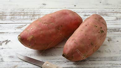 Fresh raw sweet potatoes from the garden