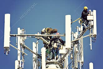 Crew installing antennas