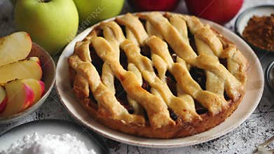Traditional baked apple pie cake served on ceramic plate
