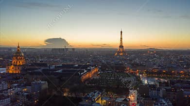 Day to Night Time Lapse over Paris with view of Eiffel Tower and Beautiful Sunset, Aerial Hyperlapse forward