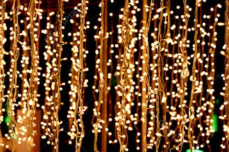 Bunch of small lights hanging on string