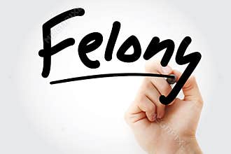 Hand writing Felony with marker