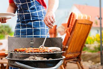 Happy family having a barbecue
