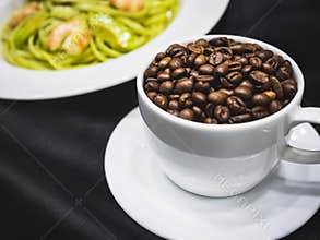 Coffee cup with coffee beans Cafe menu with spaghetti plate Food and drink