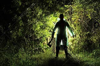 Killer with an axe in the garden