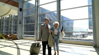 Senior couple in airport