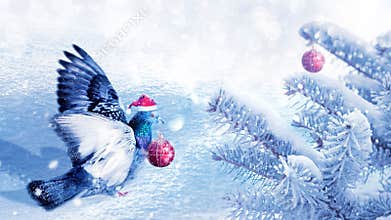 Christmas fabulous image. A dove in a santa claus hat decorates a Christmas tree in a winter magic forest. New Year card.