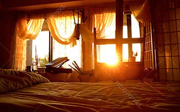 View of Sun Rising Through An Artist's Bedroom Studio Window