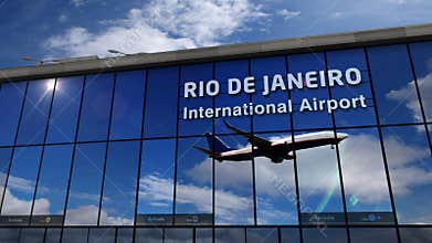 Airplane landing at Rio de Janeiro mirrored in terminal