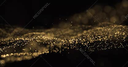 Gold glitter light particles splash wave, bokeh effect on black background. Shining gold sparks, shimmering sparkles glow in wave