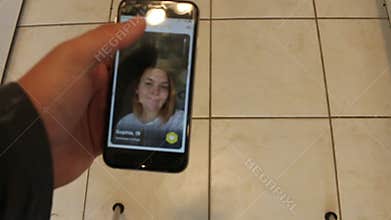 London Canada, September 29 2019: Editorial illustrative video of someone swiping through the bumble dating app on their