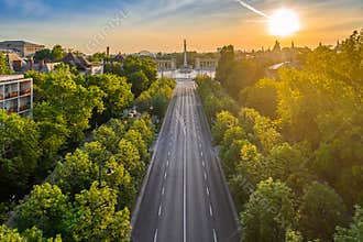 Budapest, Hungary - Aerial drone view of Andrassy street at sunrise with Heroes` Square Hosok tere at background