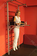 The woman in fitness centre