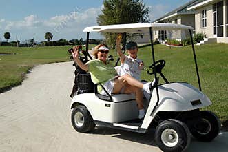 Senior ladies in golf cart