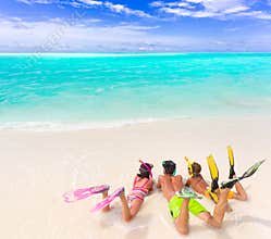 Kids on beach with dive gear