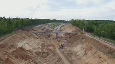 Aerial view of the construction of the highway , consisting of bridges, overpasses crossing canals, swamps, railway and road