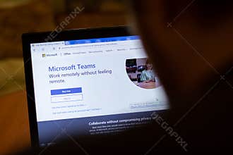 New York, USA - 9 April 2020: Microsoft Teams website on laptop screen close up. Man using service on display, blurry background,