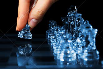 Strategy chess game woman fingers moving pawn