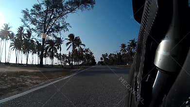 The Rider ride on the coastal road