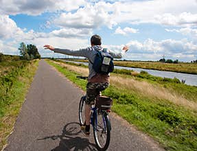 Man on bicycle having fun