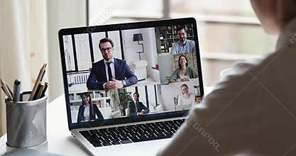 Remote employee conferencing boss and coworkers in online virtual chat