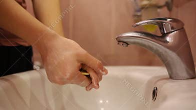 Washing hands with soap and warm water to prevent the coronavirus pandemic. Hand hygiene with antiseptics and disinfectants.