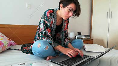 Female author writing at home