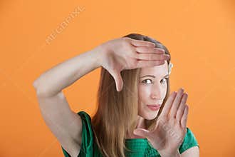 Beautiful Woman Framing Her Face