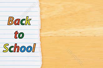Back to School background with lined paper on a desk
