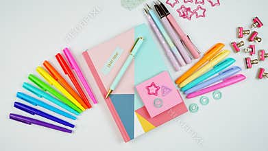 Back to school or workspace colorful stationery stop motion animation flatlay.