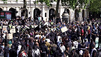 London / UK - 06/13/2020: Black Lives Matter protest during lockdown coronavirus pandemic. BLM protesters attacking EDL members at