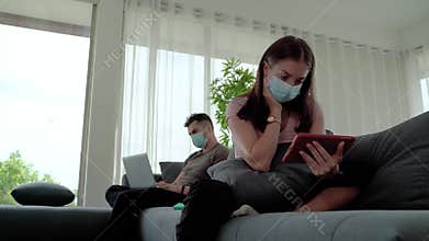 In a pandemic situation Covid-19 , quarantine measures young people work at home to avoid getting infected.