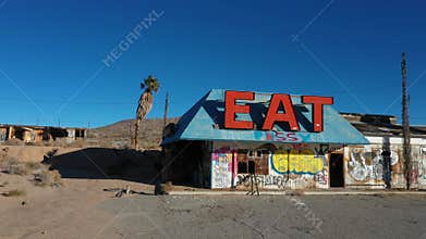 Aerial ghost town abandoned cafe Halloran Springs California 4K 216
