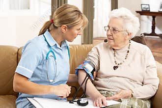 Senior Woman having Blood Pressure Taken